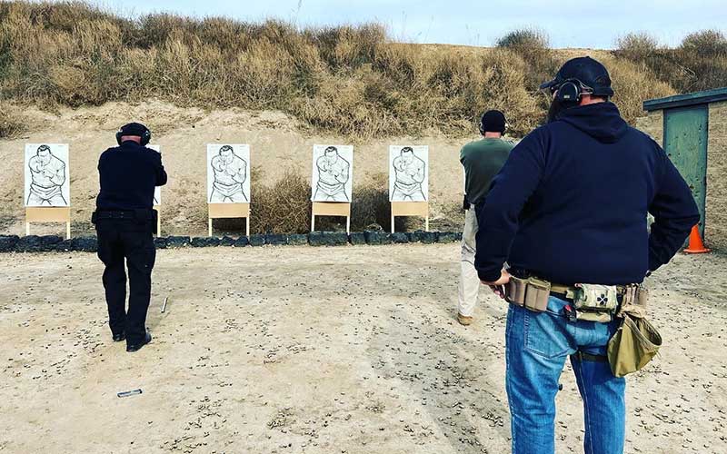 men at a firearms course